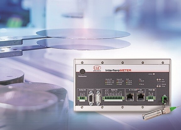 White light interferometer against semiconductor wafer backdrop