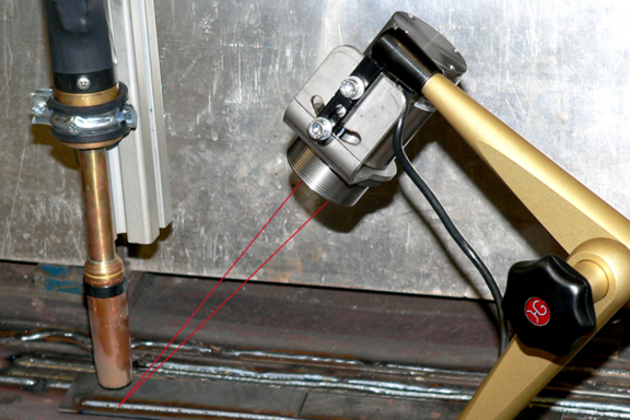 IR temperature sensor with laser spot monitoring weld temperature